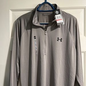 Men’s Under Armour 1/4 zip Heat Gear lightweight top. New with tags. Size XXL